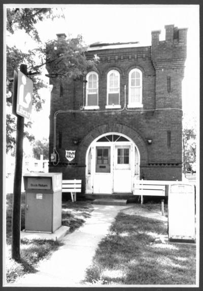The original town hall, circa 1970, included the police station on the first floor and the cozy 300 square foot library on the second floor. 